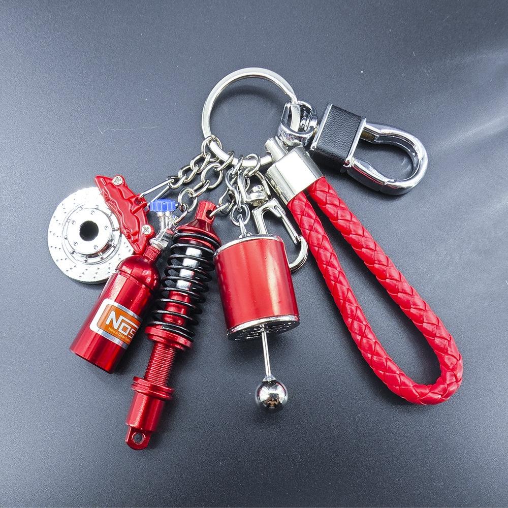 Creative Metal Keychain, Turbo Gear Wheel Hub, Brake Disc, Shock Absorber, Caliper, Car Keychain Pendant, Popular Fashionable And Personalized Outdoor Car Accessory Keychain, Car Nitrogen Pendant Keychain Modification Simulation Gift Keychain Pendant.