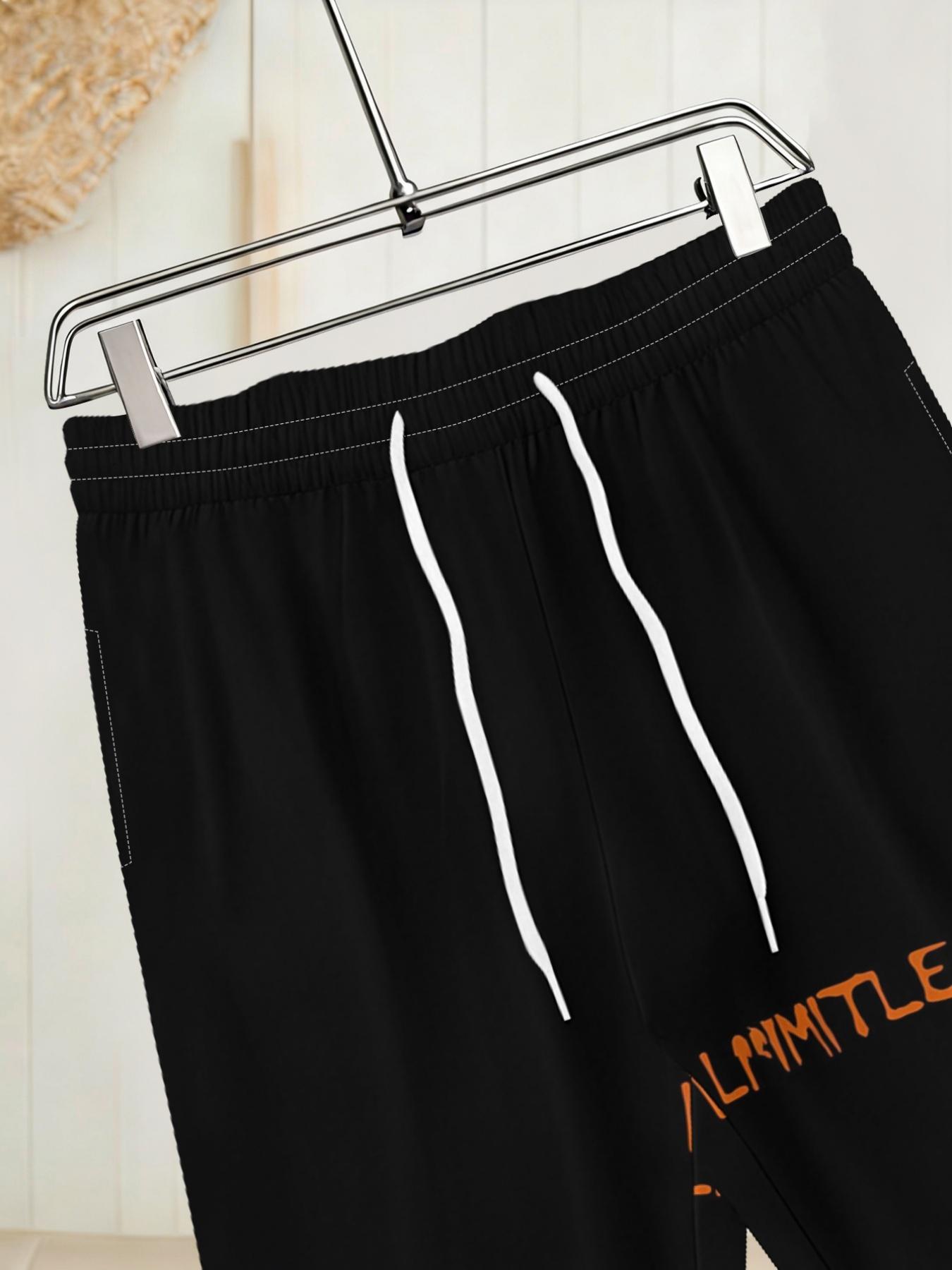 Stylish Men's Printed Track Pants with Gradient Orange Print, Drawstring and Pockets. Comfortable and Casual, Made of Stretch Polyester.