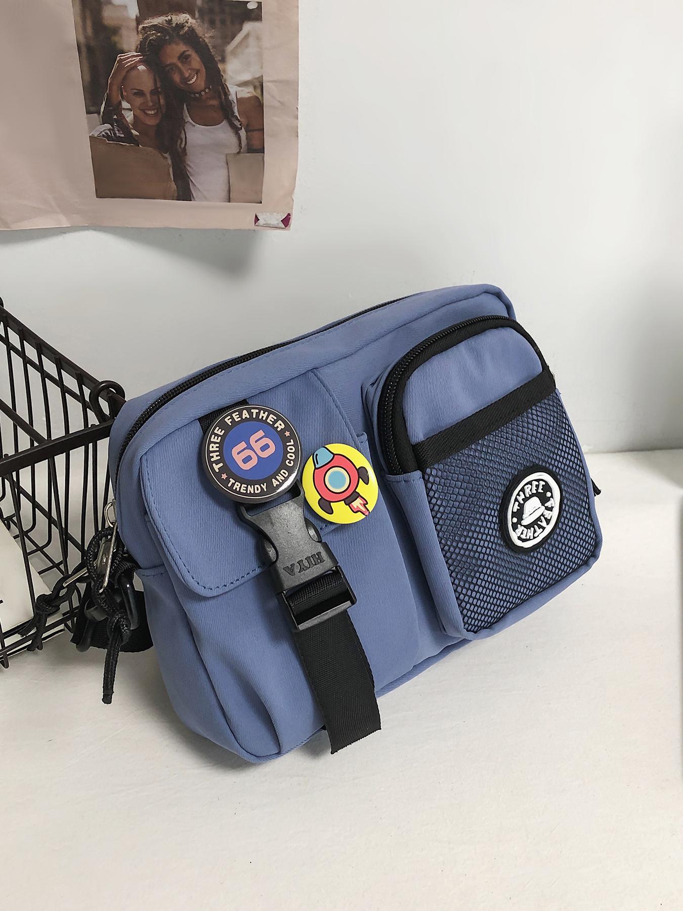 Black fashionable casual simple shoulder bag, practical and atmospheric texture crossbody bag, with badge and alien pendant pendant design, can accommodate mobile phones and keys, suitable for walking and shopping