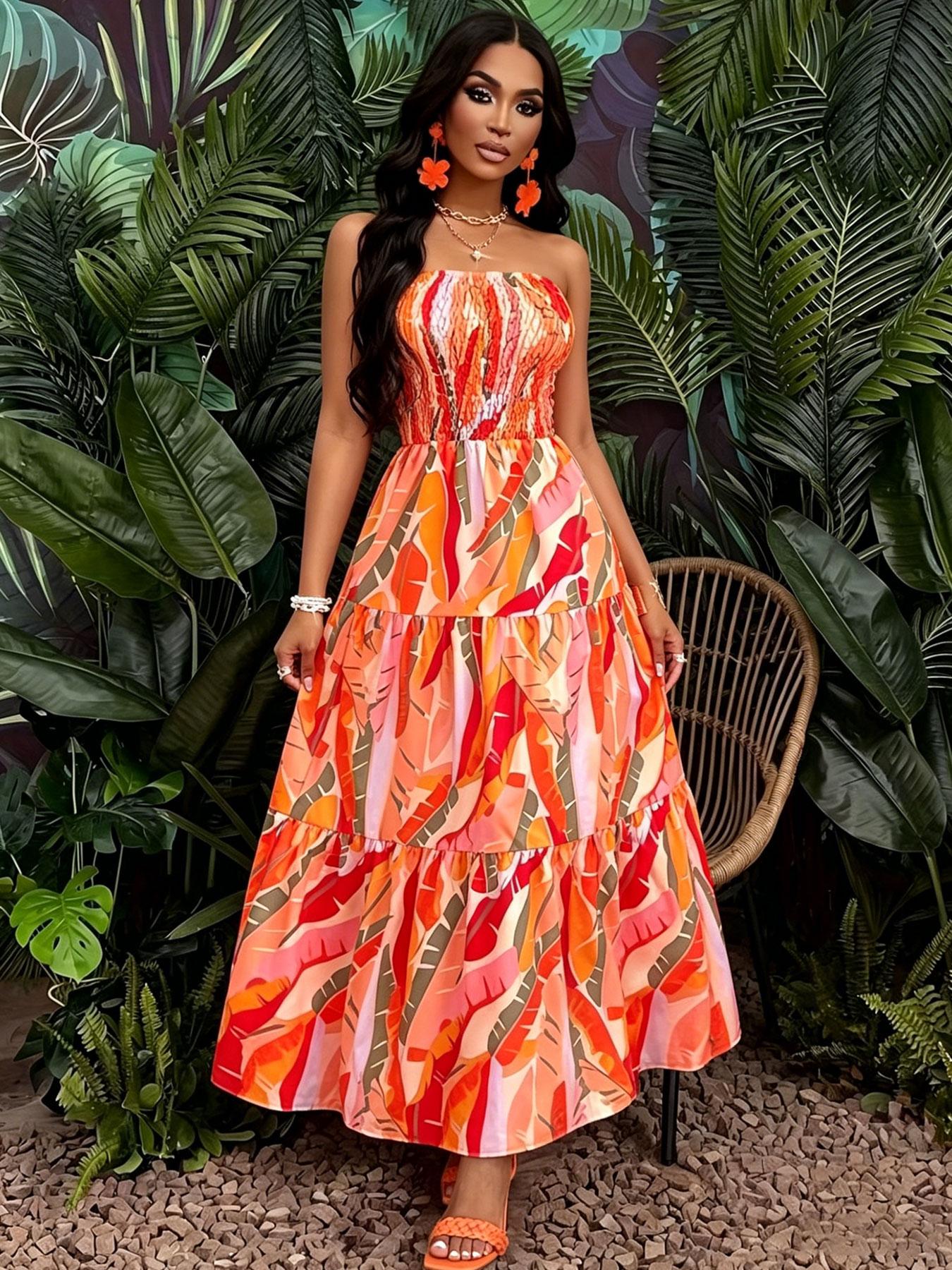 A women's orange-red color-block tropical floral print strapless tube long fashionable dress, suitable for summer, island vacations, tropical trips, and summer parties.