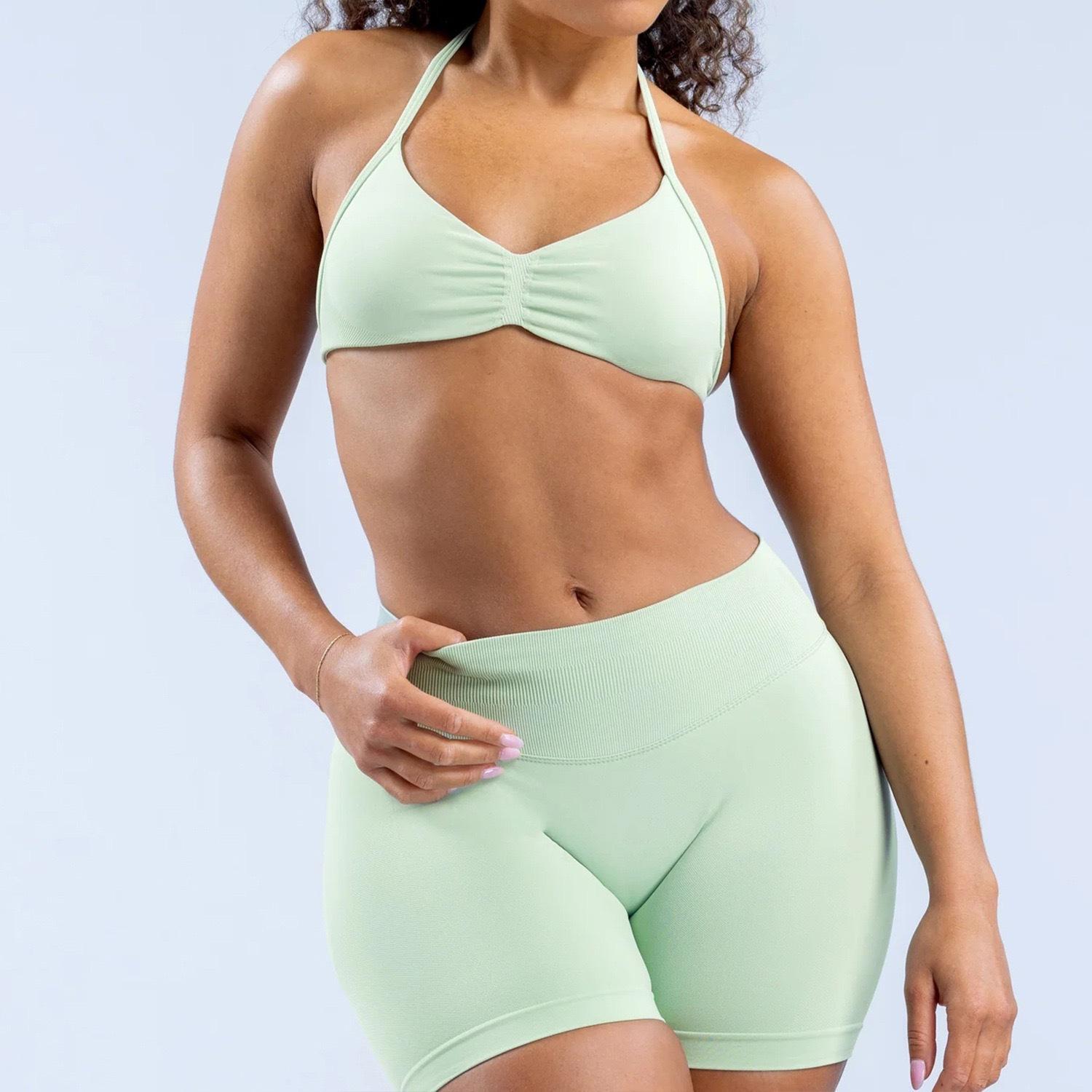 DFYNE halter neck bra with backless design and hip-lifting shorts are highly elastic and won't dig into your skin. They're versatile enough for both workouts and everyday wear.