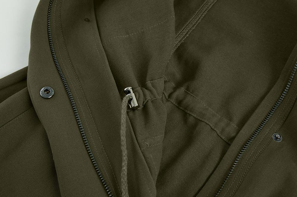 Hidden front zipper detail on the military jacket