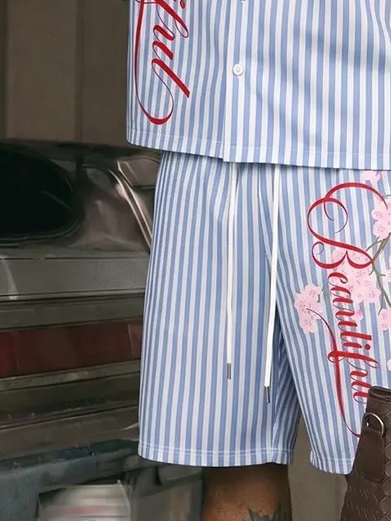 Men, Menswear, Blue White Vertical Striped Cherry Blossom Cursive Print Two Piece Outfit Oversized Short Sleeve Button Down Shirt Drawstring Waist Shorts Vintage West Coast Chicano Matching Summer Couple Tracksuit