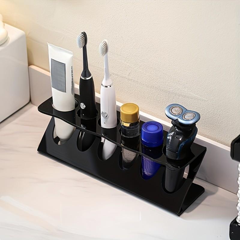 1 Pc Electric Toothbrush Organizer Stand – Multi-function storage rack for toothbrush, razor and toothpaste. Compact bathroom countertop holder, perfect for keeping toiletries neat and organized at home.