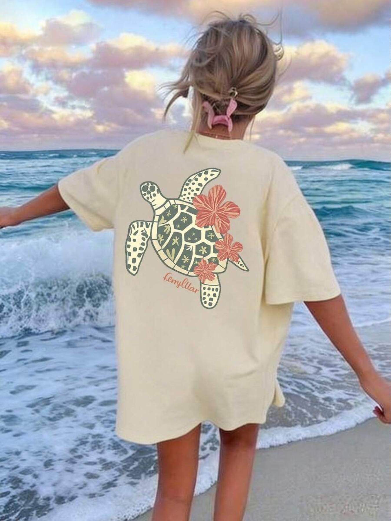 Women's Oversized Sea Turtle Floral Graphic T-Shirt, Back Print Hibiscus Flower, Casual Loose-Fit Short Sleeve Crew Neck Top