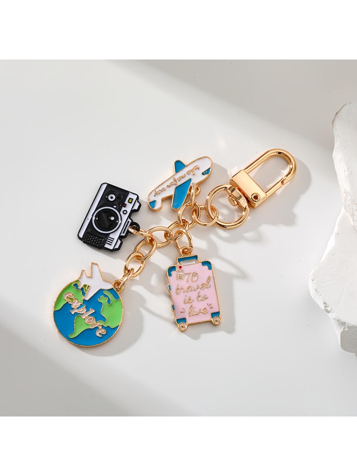 1pc Travel-themed keychains - Containing aircraft, camera, Earth and luggage accessories, stylish enameled metal keychains are perfect for decorating and the perfect gift for travelers