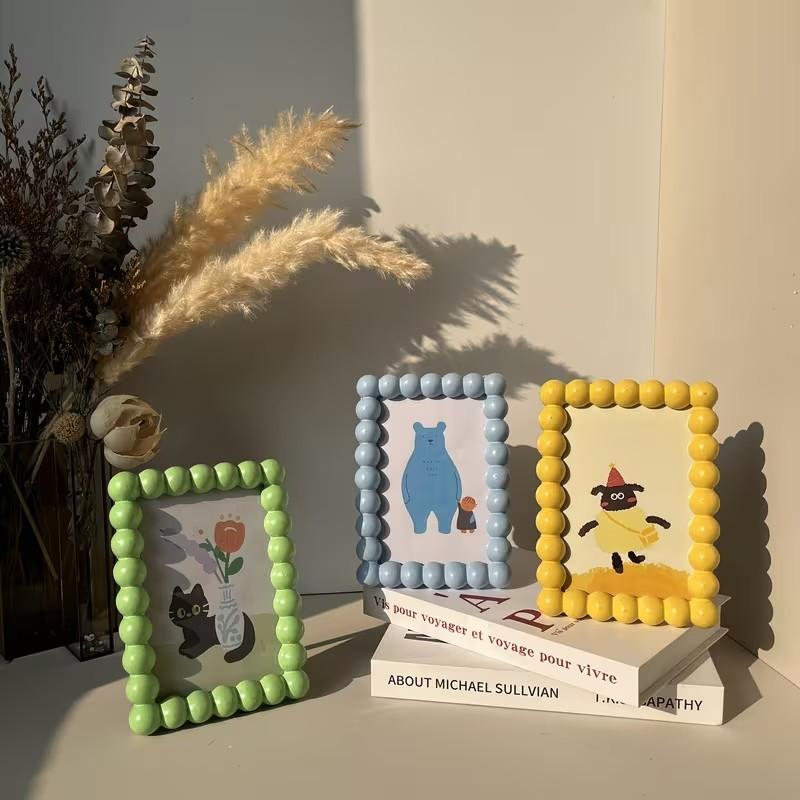 Cute Resin Decorative Photo Frame — A charming home accent and desktop photo display stand, perfect for showcasing family photos; holds 6-inch prints.