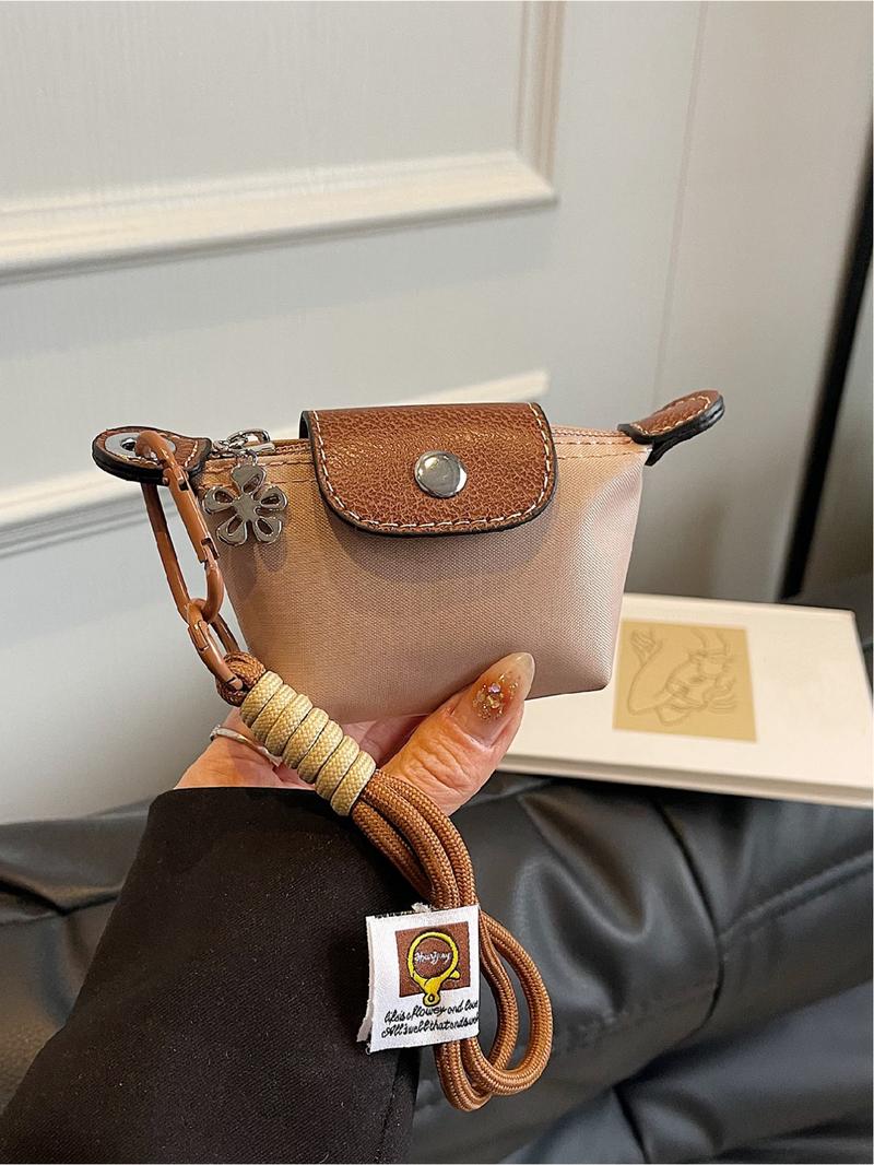 Mini women's flip button casual and compact handbag, wrist pocket, multiple colors to choose from, suitable for daily clothing matching, fashionable for going out.