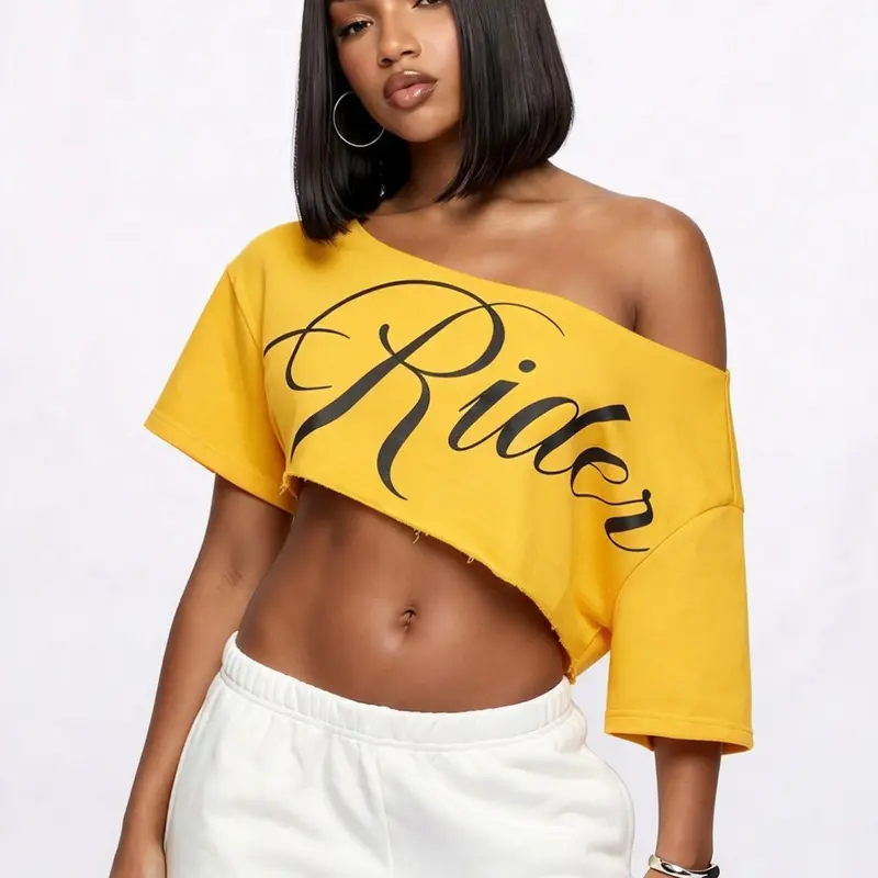 Women's Cursive Letter Print Asymmetrical Off Shoulder Crop Tee Raw Trim Short Sleeve Cropped T-Shirt 2026 Summer Streetwear Daily Trendy Going Out Stylish Viral TikTok Fashion Essential Top