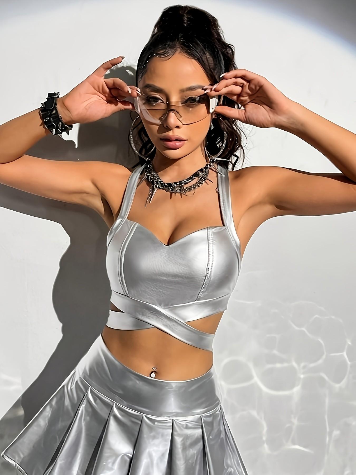 Women Y2K Metallic Silver Crop Top Sexy Futuristic Cyberpunk Rave Festival Concert Outfit Baddie Aesthetic Shiny PU Leather Strappy Criss Cross Back Cutout Bustier Corset Going Out Club Party Trendy Halter Shirt