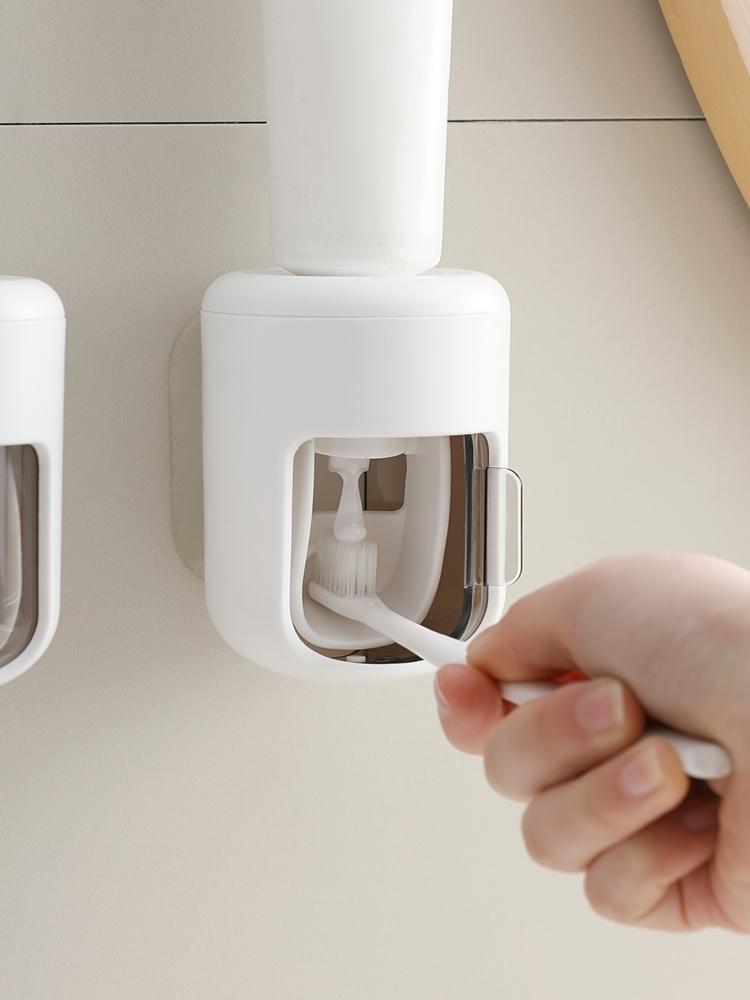 Automatic Toothpaste Squeezer Dispenser, Dustproof Wall-Mounted Design, Toothbrush Storage, Easy-To-Use Oral Care Accessory for Home Bathroom Essentials
