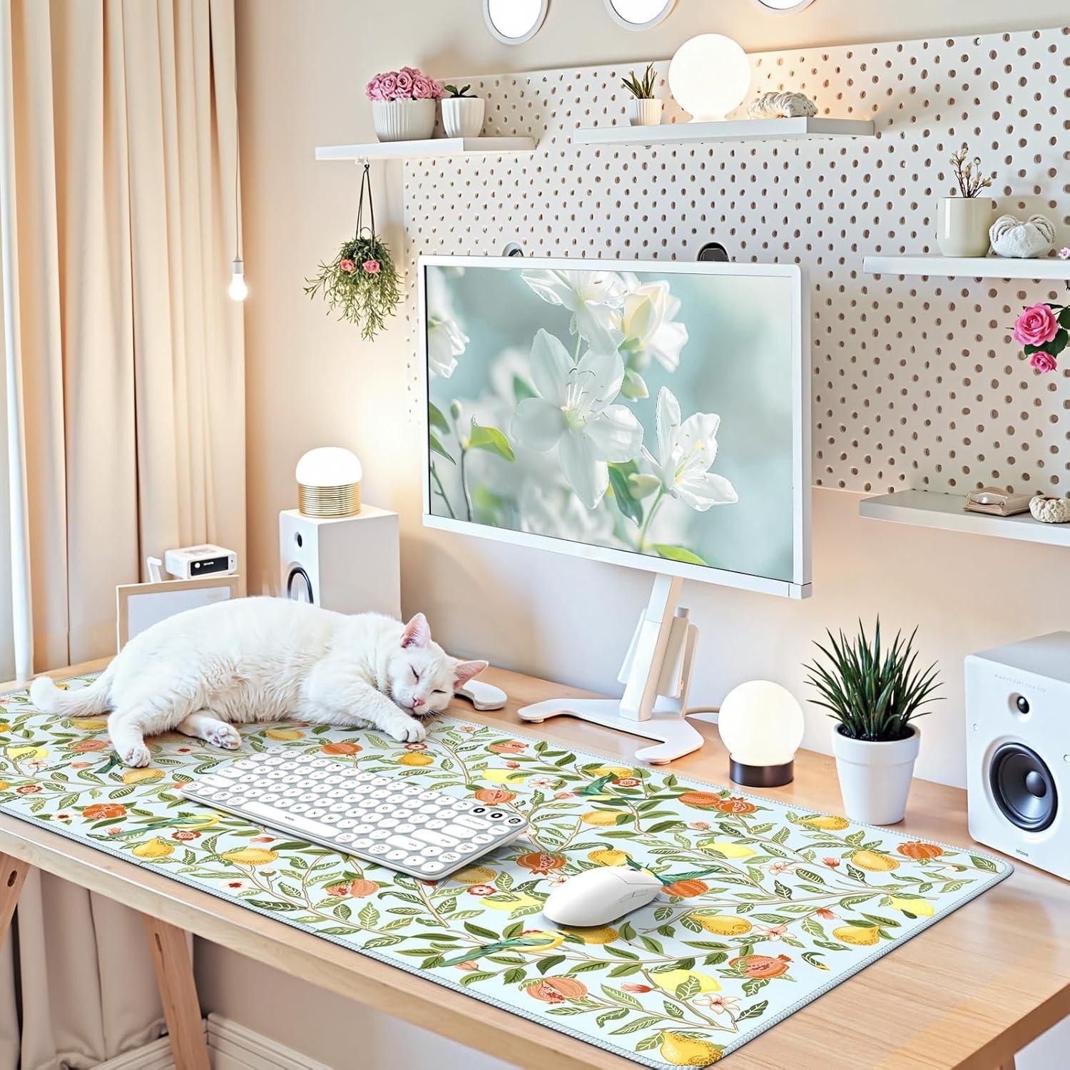 A 190 floral and fruit patterned mouse pad that adds comfort and style to your workspace, with a filling design for better support, the perfect gift for nature lovers and students