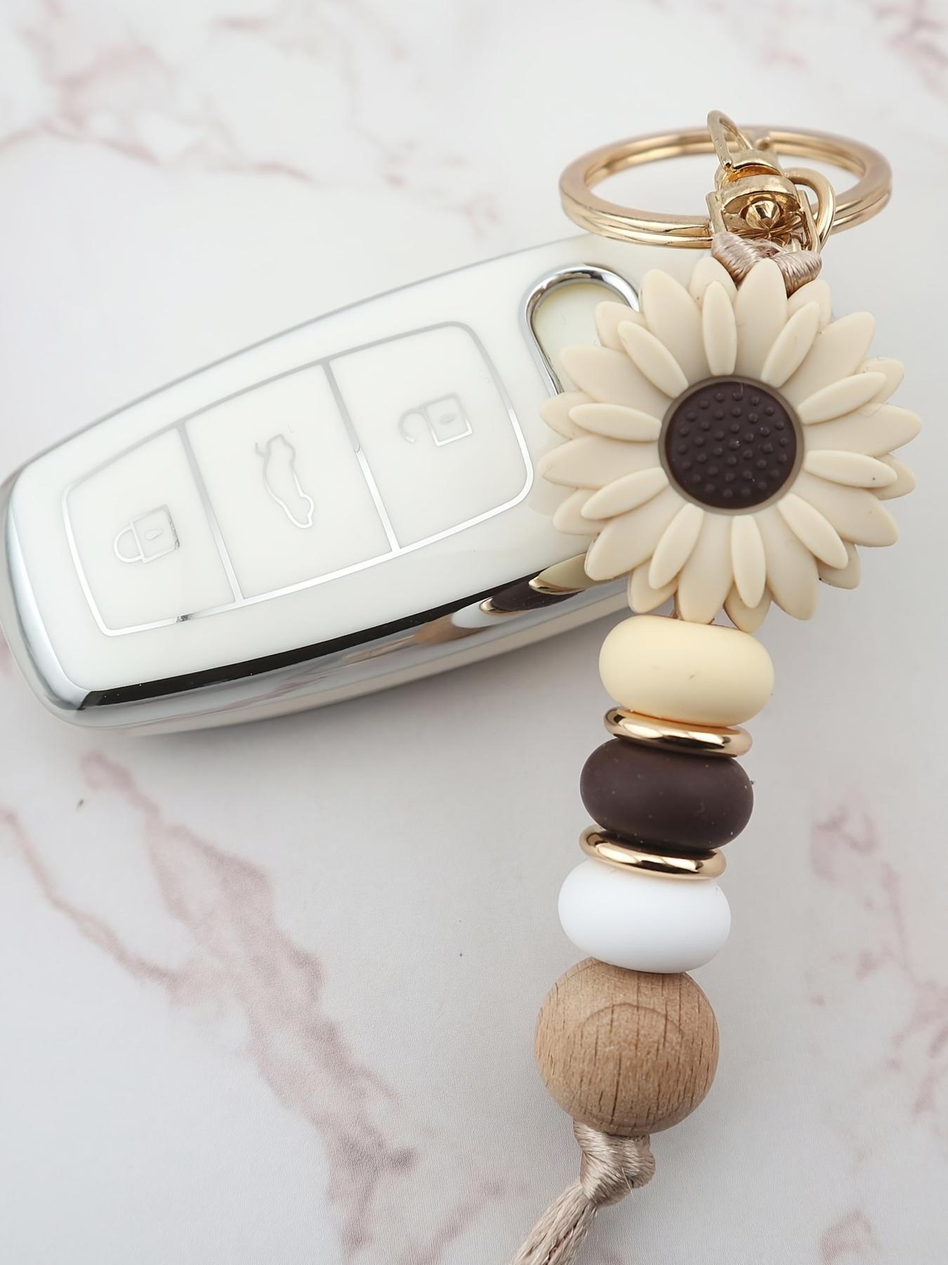 Fashionable and cute sunflower pendant keychain, suitable for daily wear, vacation and dating occasions, and also a surprising and exquisite small gift.