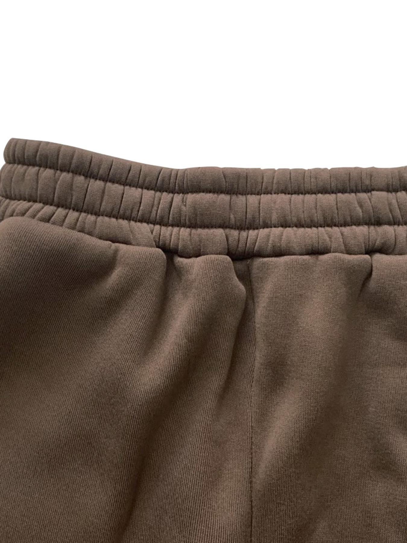 Two-piece women's solid-color crew-neck pullover with long sleeves and elastic waist and loose-fitting bottom pants, perfect for all occasions and versatile in style.