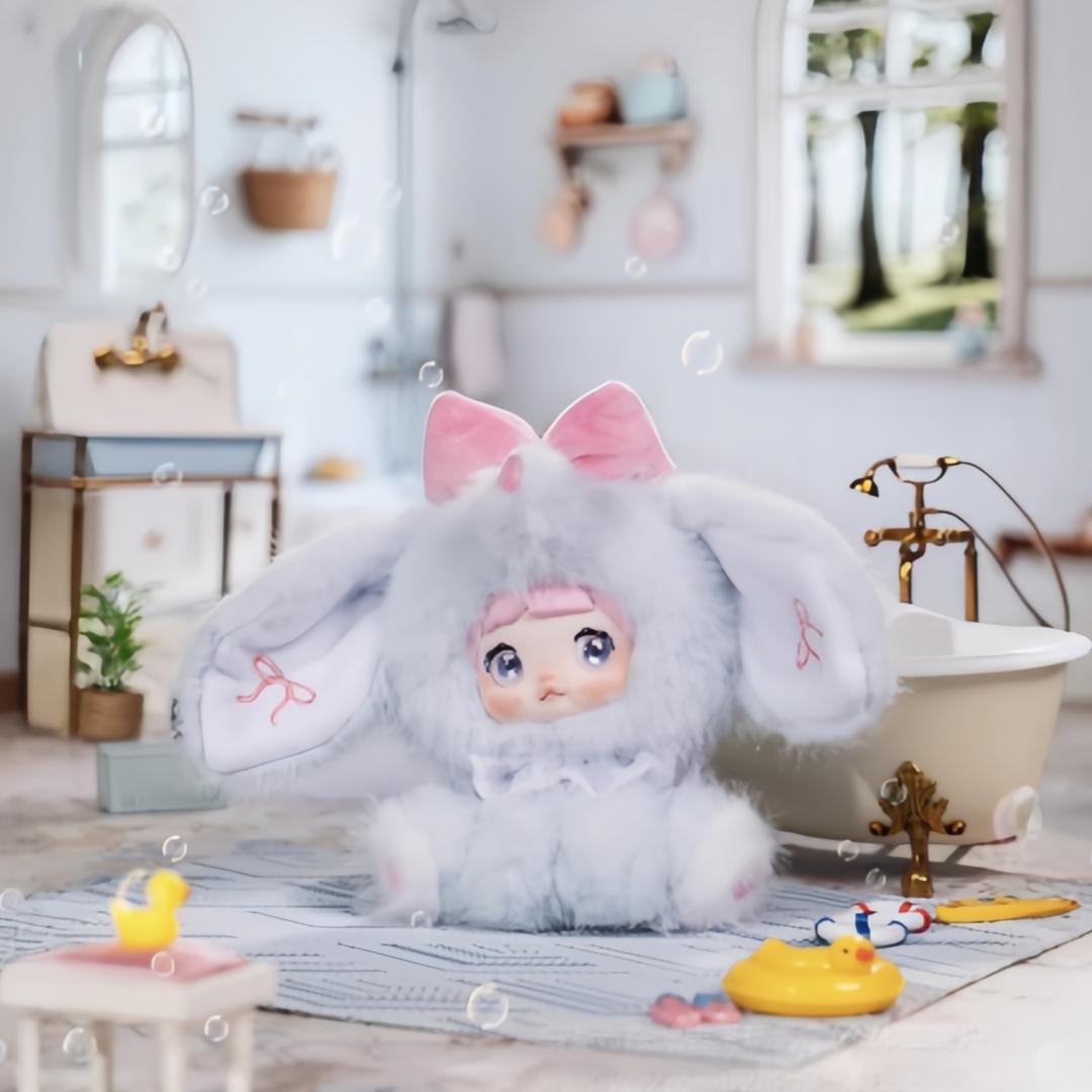 Nommi - Sitting Zoo Series New Plush Blind Box (1 Blind Box) Cute plush keychain with three sets of rotating eye patches for expression changes. Plush keychain blind box, trendy collectible figurine, gift. Suitable for car, desktop display,or bag charm