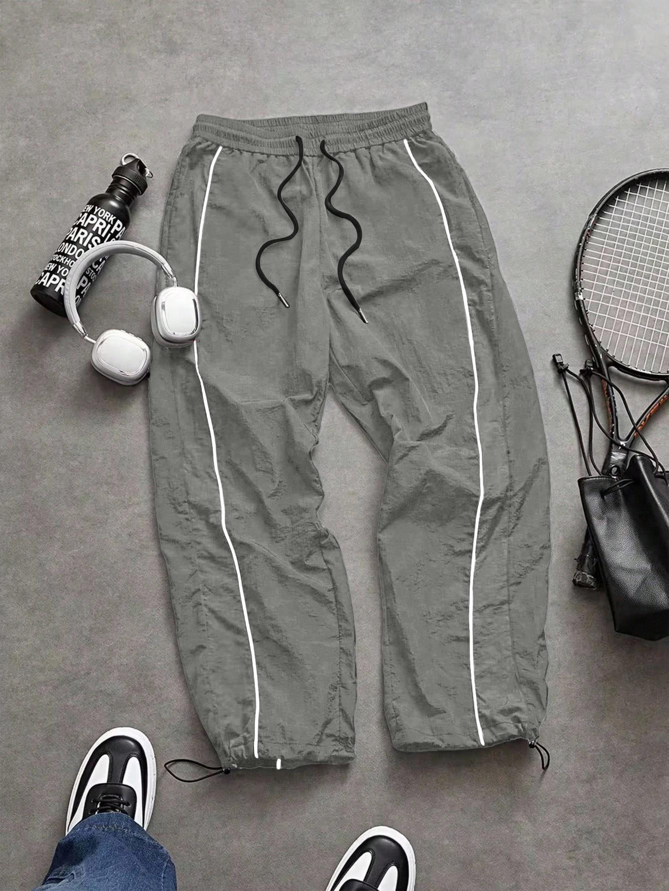Men's lightweight, breathable, reflective printed wide-leg pants with adjustable leg openings and drawstrings, elastic waist, casual pants suitable for outdoor sports, fitness, campus commuting, street fashion, and versatile long pants