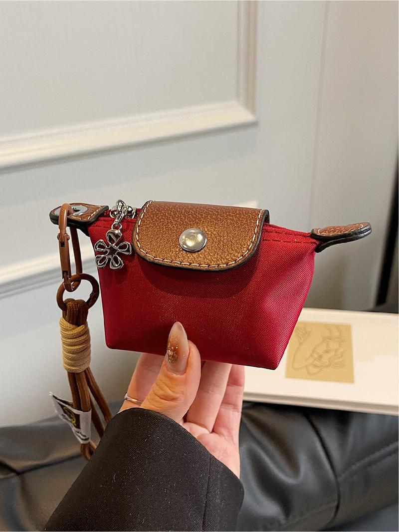 Mini women's flip button casual and compact handbag, wrist pocket, multiple colors to choose from, suitable for daily clothing matching, fashionable for going out.