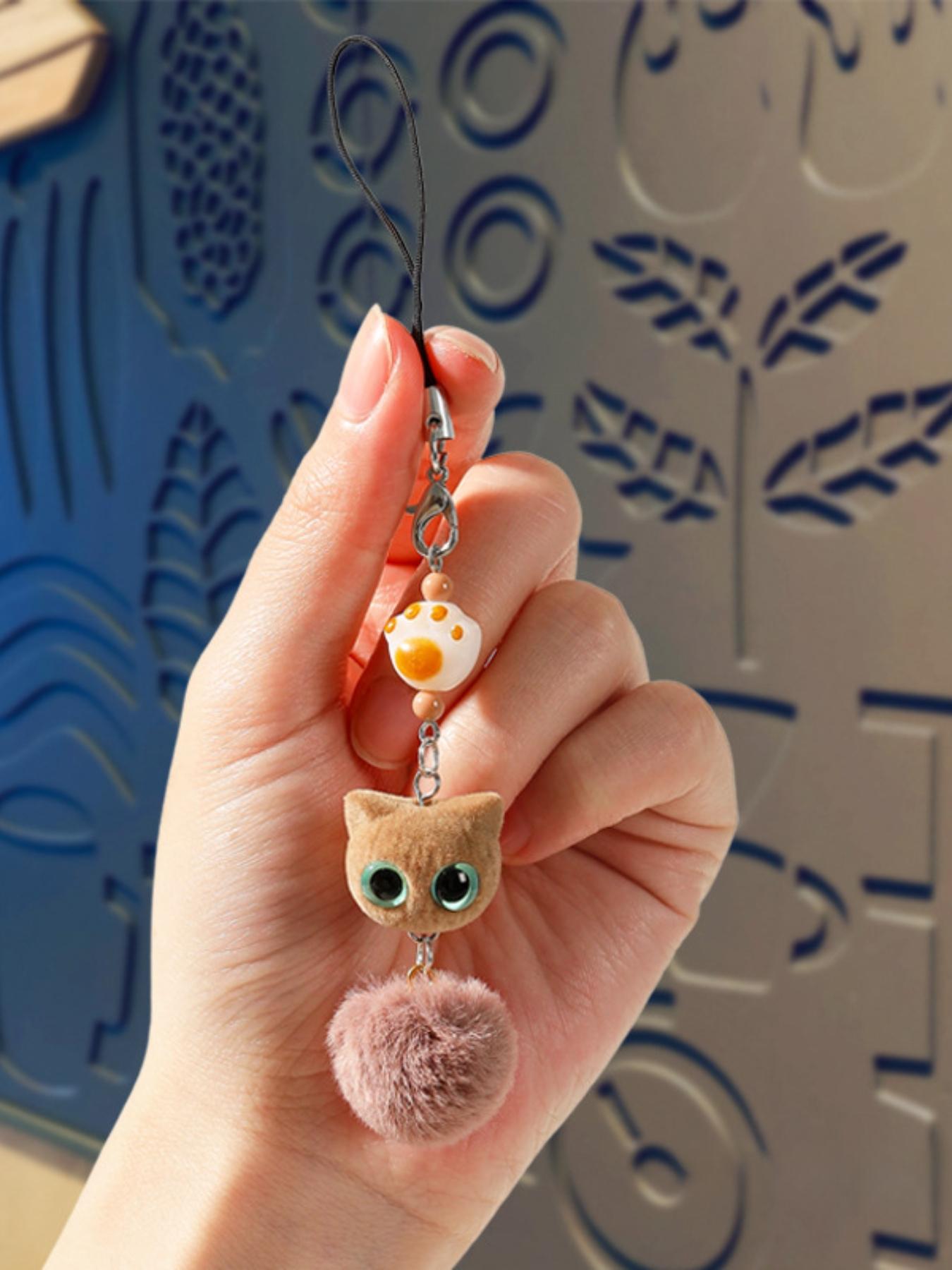 Flocked big-eyed black cat cartoon phone chain pendant, exquisite and cute beaded bag keychain pendant, children's gift