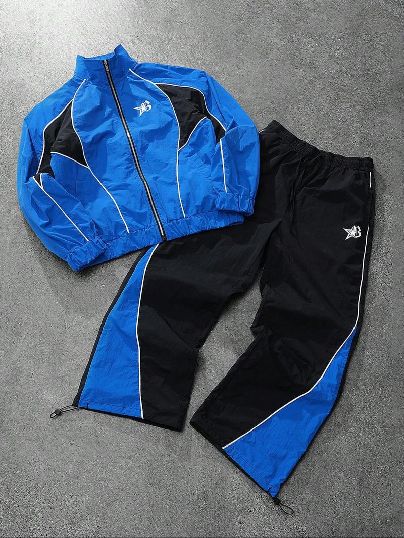 This men's two-piece Athletic Tracksuit Set includes a turtleneck jacket and sweatpants, featuring a striking blue and black color-block design with a unique sheen. Suitable for outdoor activities and casual wear, it also makes a great holiday gift.