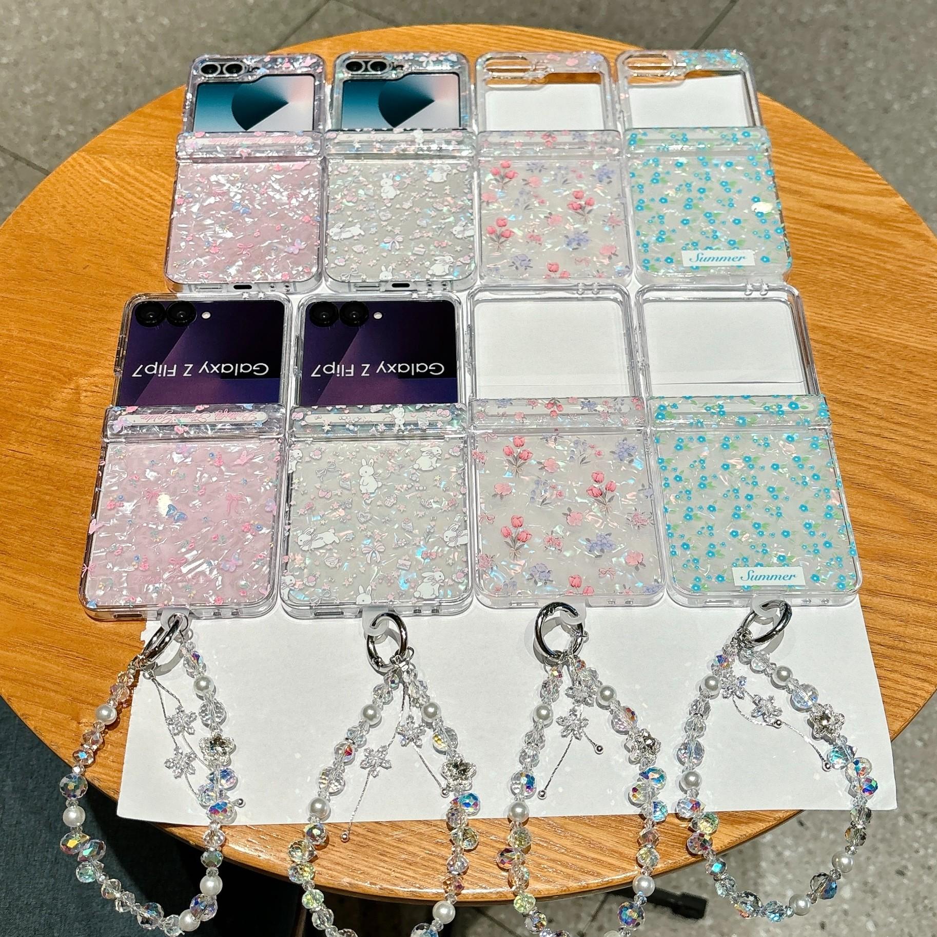 Fresh Floral & Magnetic Snap Shell Pattern Phone Case with optional wrist strap for easy carrying. for Samsung Galaxy Z Flip 5/6/7FE/7. Features a refreshing style, fashionable protection, and unique design perfect for daily use. Protective outer shell.