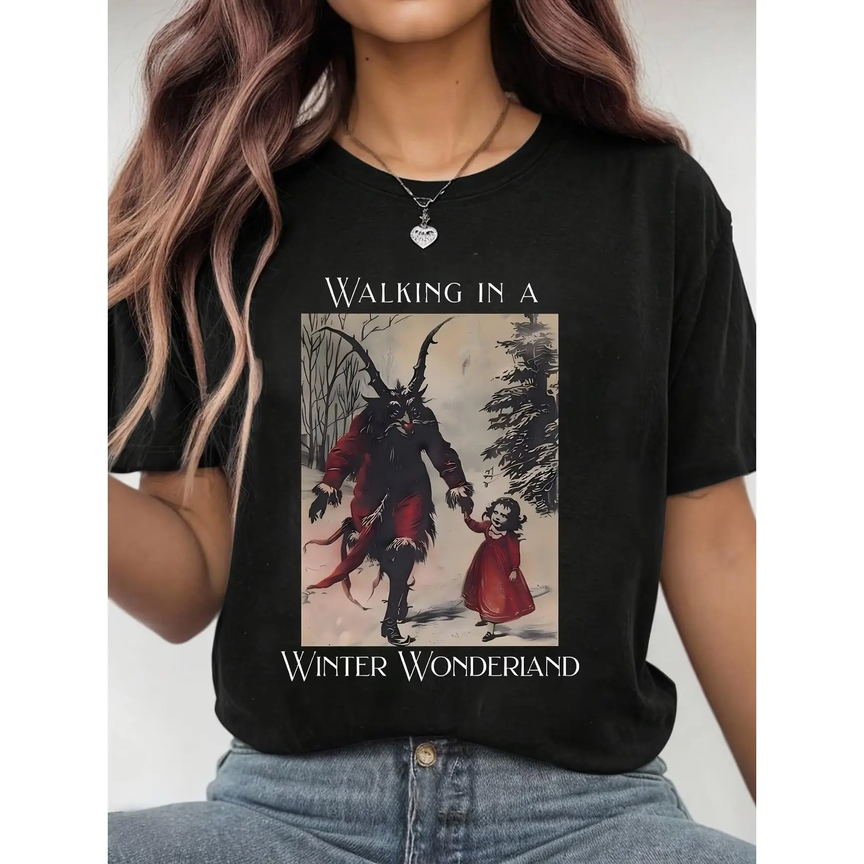 Krampus Winter Wonderland Snow Graphic Tee – Cute Oversized Cotton Shirt, Dark Christmas Fashion Outfit, Comfort Fit, Perfect Valentine’s Gift for Her, Best Holiday Present for Gothic Style Lovers
