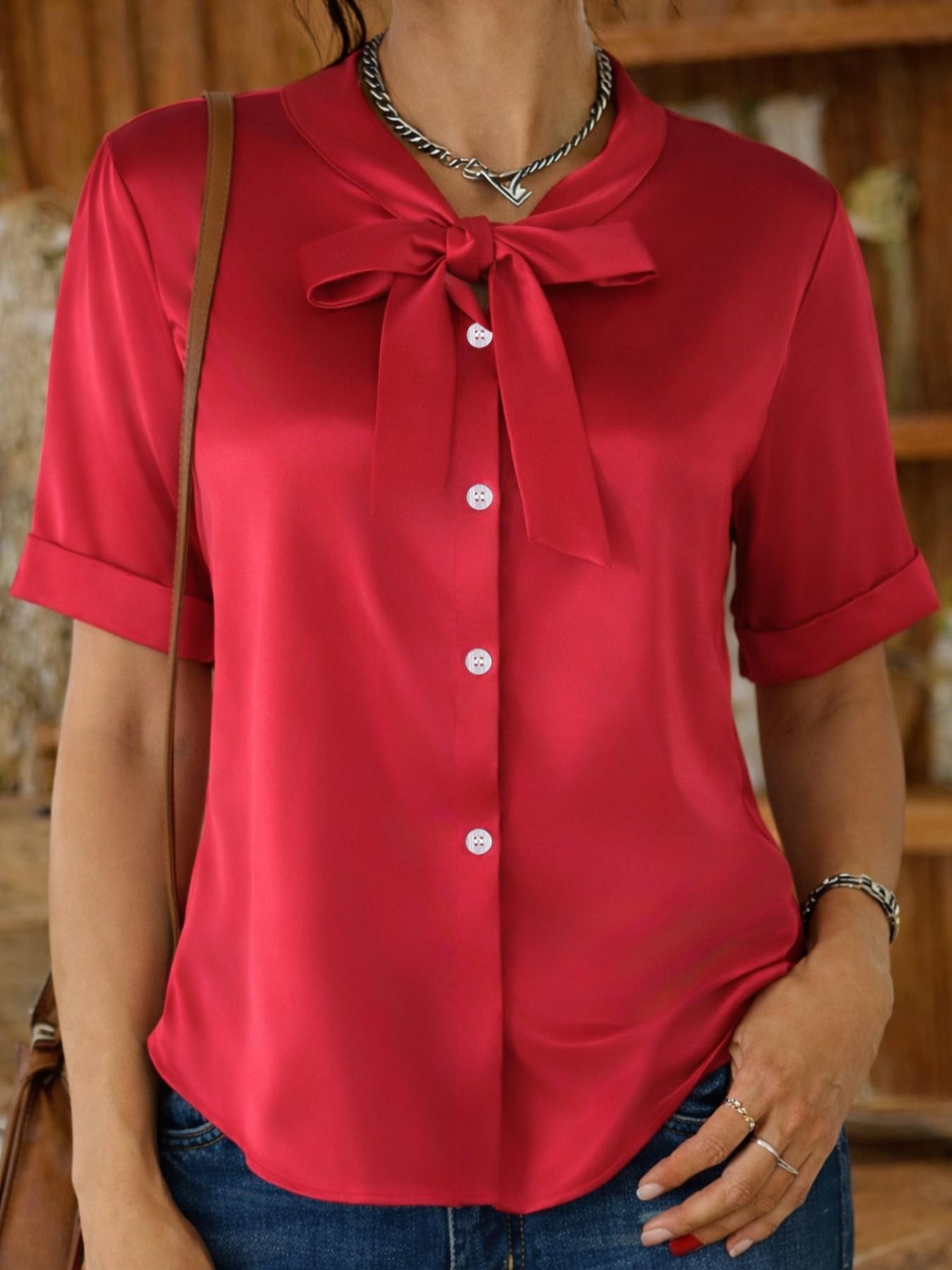 Classic short-sleeved satin shirt with a ribbon detail at the neckline, Fitted Elegant solid color, perfect for spring and summer wear. A stylish women's Smooth Blouse
