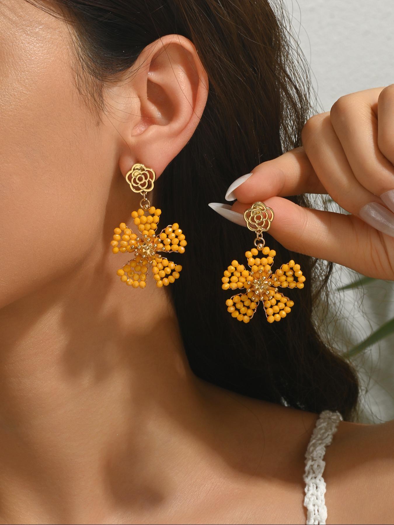 A pair of handcrafted, bohemian-style vintage dangle earrings featuring beaded floral designs—the perfect gift for a loved one, mother, or friend. An ideal present for Valentine's Day, Mother's Day, International Women's Day, wedding season, Thanksgiving