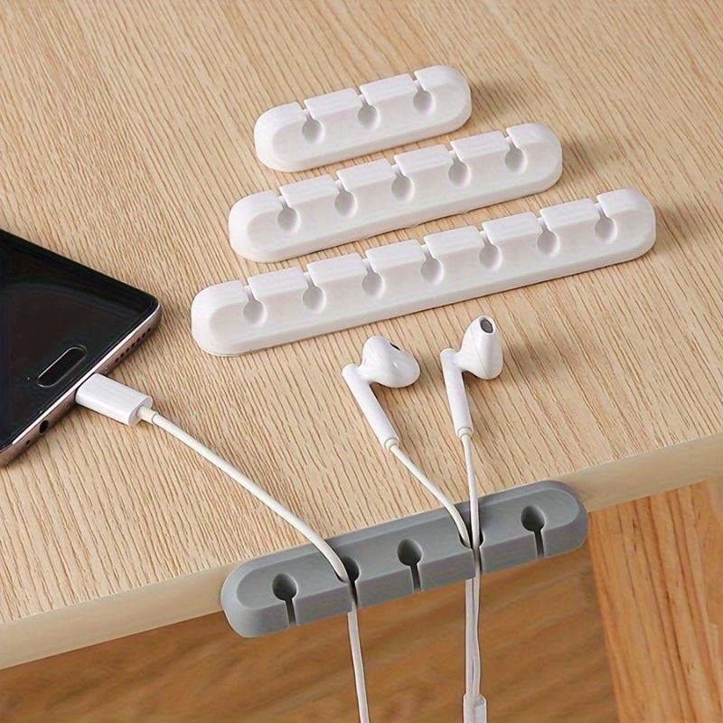 A desktop data cable storage and organization device, a charging desktop cable protector for cable storage and organization, Desk Organizer Tidy