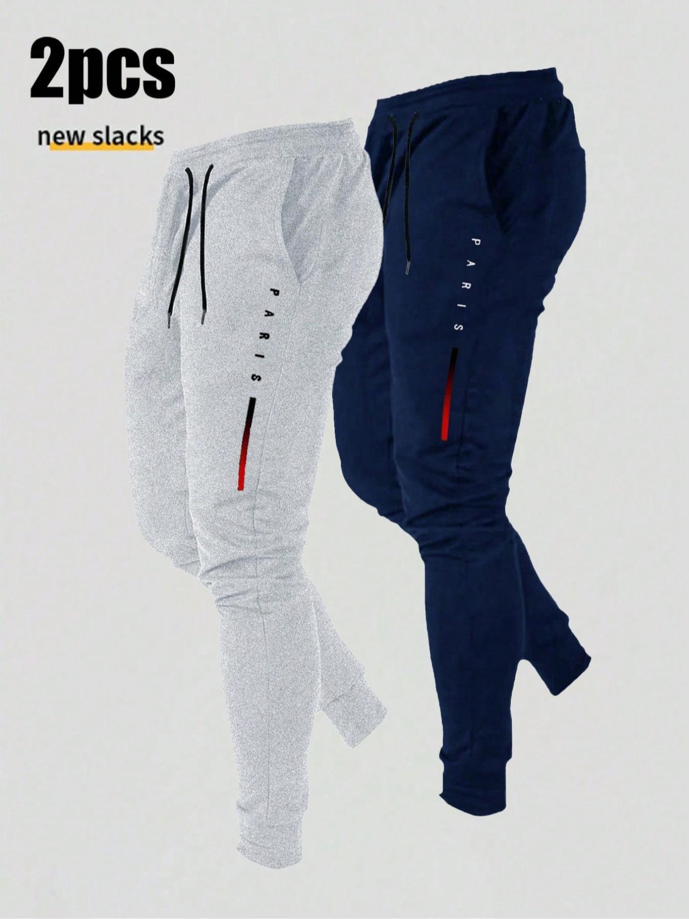 TikTok Viral 2pcs Graphic Jogger Pants – Black & Grey PARIS Letter Print Soft Cotton Fleece Slacks | Trendy Red Stripe Detail Streetwear Joggers | Mens Aesthetic Casual Daily Wear | TikTok Trending Drip Fit Comfortable Pants for Hangouts & Errands | Styli