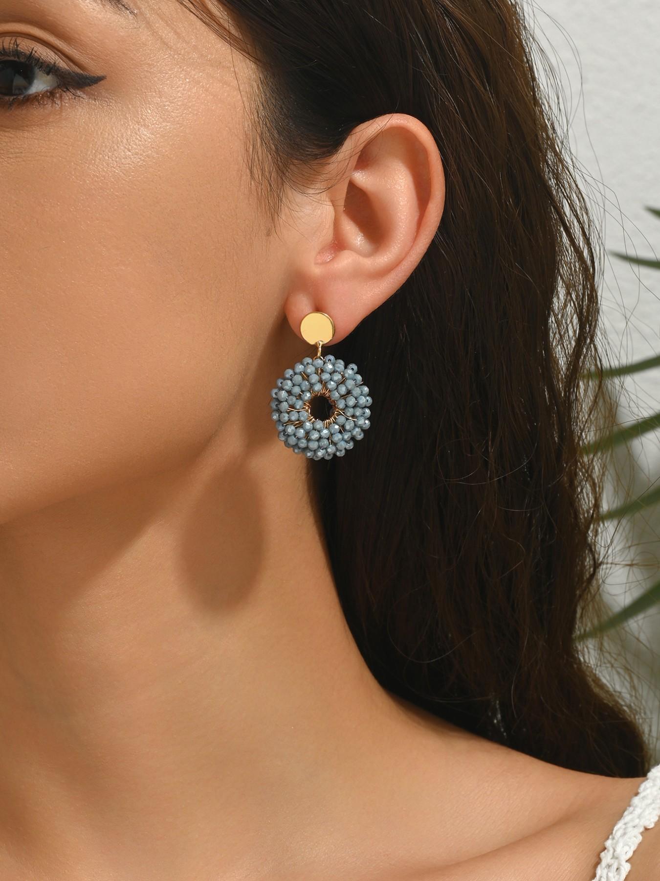 A pair of pure handmade, beaded circular dangle earrings featuring a dazzling "Bling-Bling" effect and a chic Bohemian resort style. These vintage-inspired, ethnic-style earrings offer a unique, versatile, and minimalist aesthetic—exuding elegance