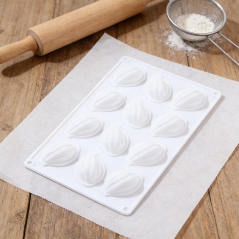 1pc cocoa bean-shaped silicone cake mold, 12-cavity chocolate material aesthetic design, non-stick, smooth surface for easy demolding in a full row, suitable for handmade high-end chocolate, cakes, and handmade baking tools