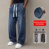 Men’s autumn jeans with slight stretch, vintage wash finish, thick fabric, loose straight-leg fit; drawstring design for easy adjustment and versatile casual wear; regular men’s long pants for everyday use.
