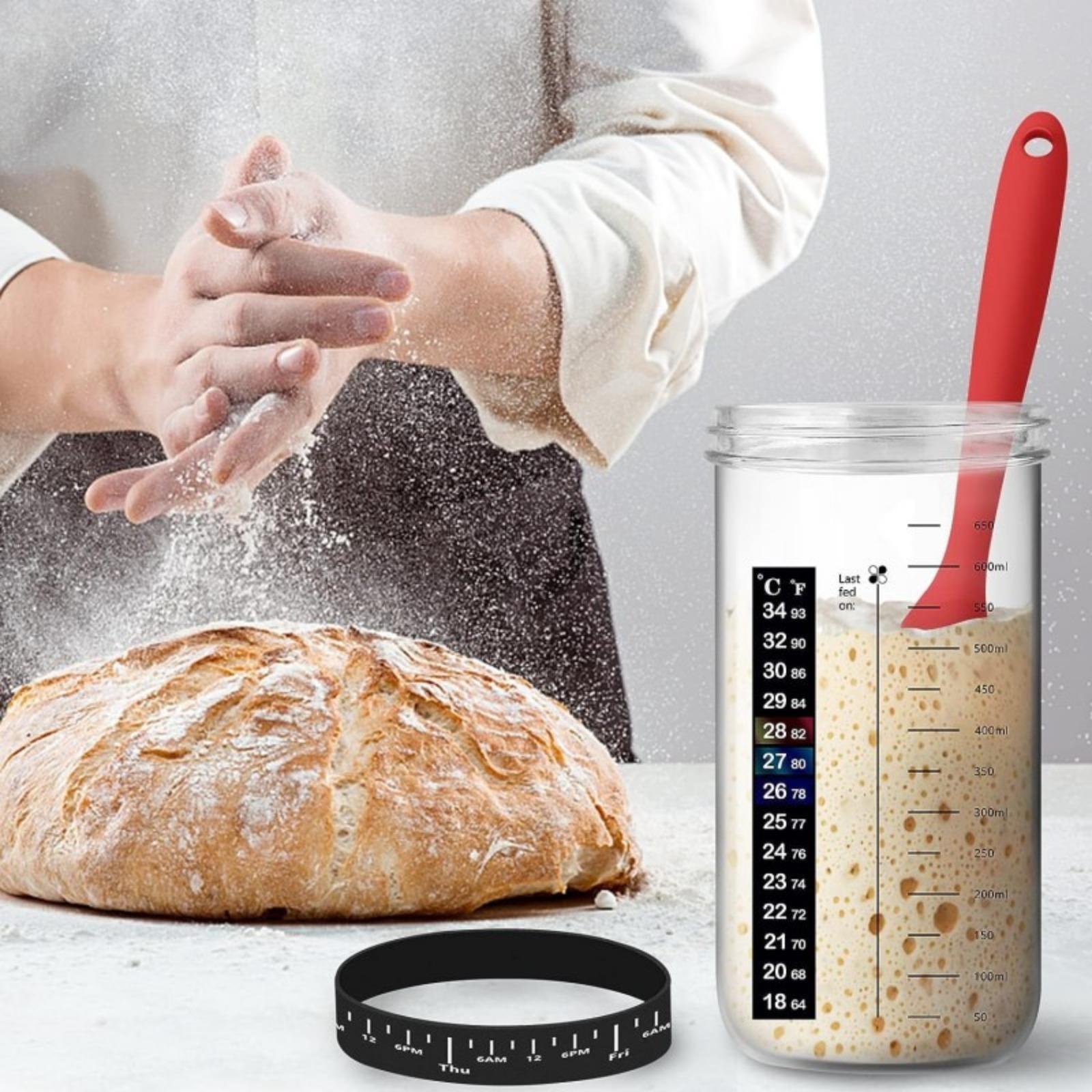Bread fermentation jar, labeled feeding belt, thermometer, scraper, cloth cover and silicone cover/base, glass container, baking supplies