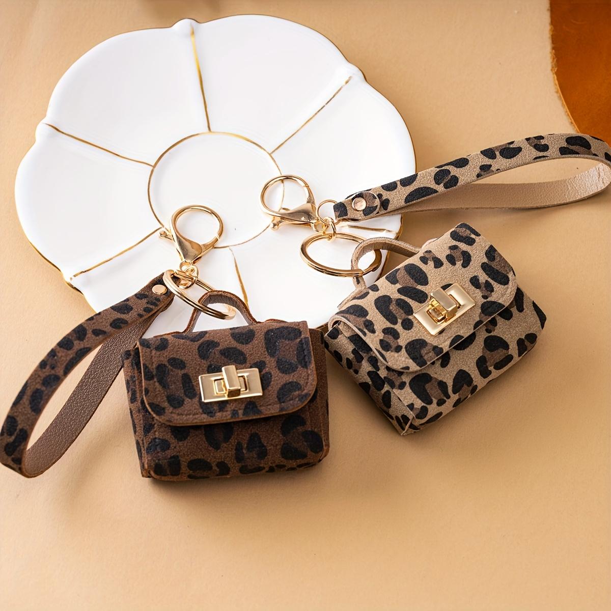 DB- Leopard Print PU Leather Keychain with Coin Pouch – Trendy Fashion Charm for Women, Mini Change Wallet Pendant for Keys, Handbags, Car Accessories, Stylish Everyday Carry Gift SpringStatements-DB DB- Leopard Print PU Leather Keychain with Coin Pouch – Trendy Fashion Charm for Women, Mini Change Wallet Pendant for Keys, Handbags, Car Accessories, Stylish Everyday Carry Gift SpringStatements-DB