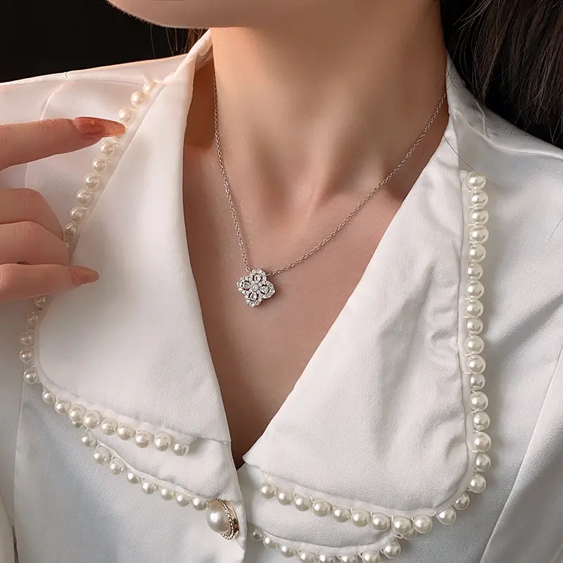 Women's Silver Four-Leaf Clover Pendant Necklace and Stud Earrings Set – Exquisite crystal lucky flower design featuring sparkling zirconia; elegant jewelry perfect for dates.