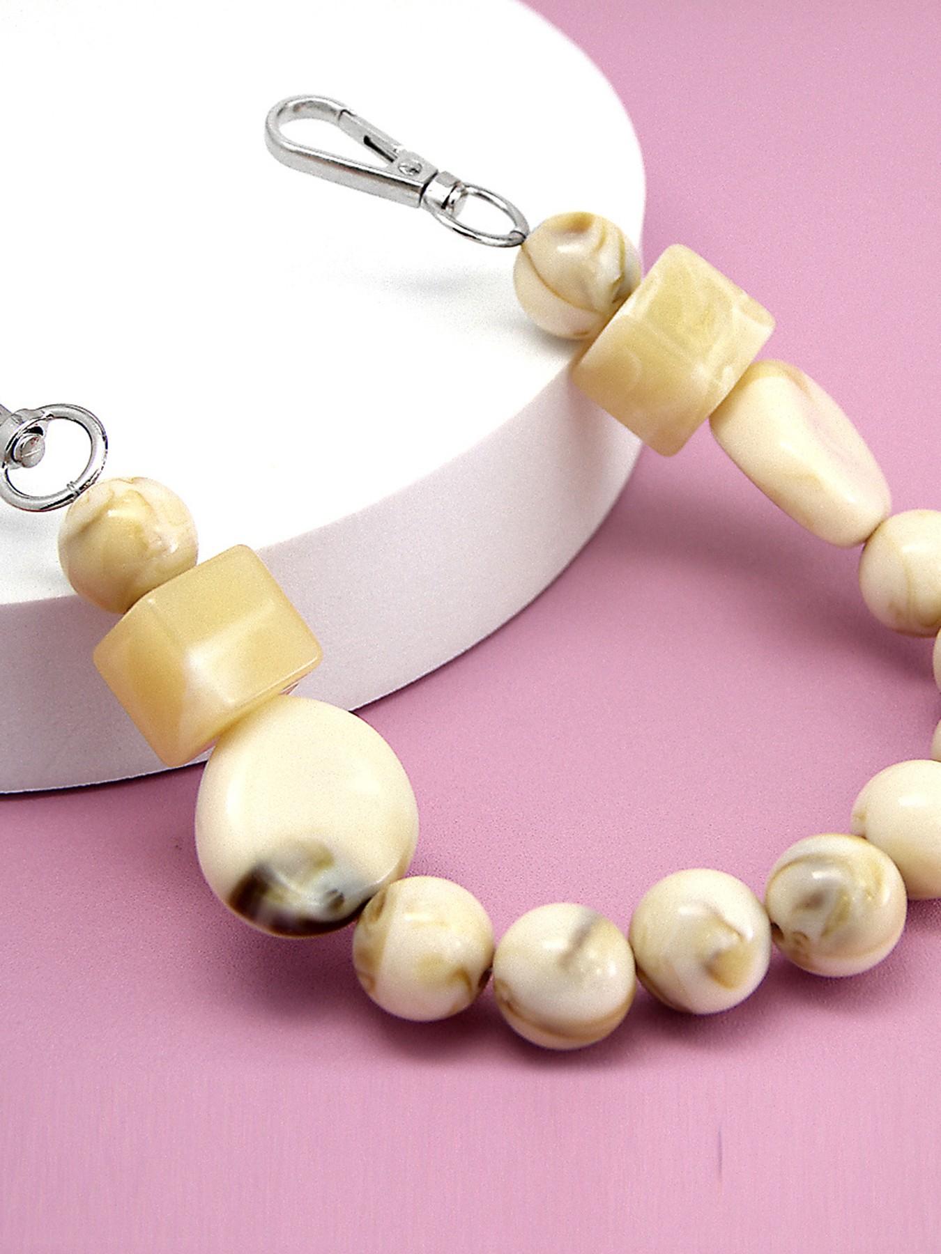 Gentle and fashionable texture bag chain, with irregular shape and round bead bead design, milk white blended color matching, exquisite and practical texture bag hanging, suitable for daily commuting, shopping