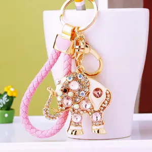 Cute Crystal Rhinestone Elephant Metal Keychain, Lovely Creative Key Ring & Bag Charm for Women. Sparkling delicate ornament, stylish daily decor for car keys, handbags and sweet small gifts for ladies and friends.