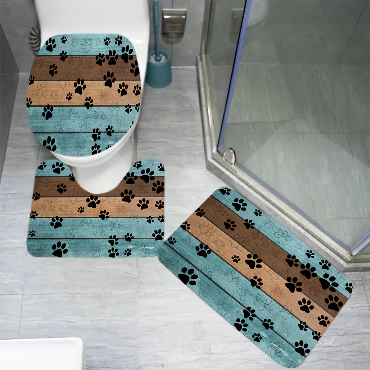 A Set of Three Cartoon Wooden Board Patterned Dog Paw Print Bathroom Toilet Additions, Including a Rectangular Mat, a U-Shaped Foot Pad, And an Oval Toilet Lid Cover. This Combination Set Features Soft And Comfortable Flannel Fabric with Super Absor