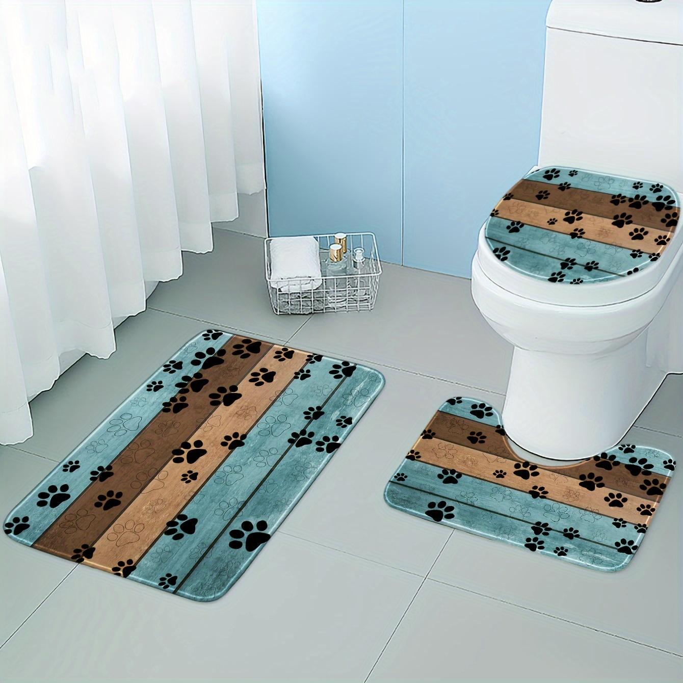 A Set of Three Cartoon Wooden Board Patterned Dog Paw Print Bathroom Toilet Additions, Including a Rectangular Mat, a U-Shaped Foot Pad, And an Oval Toilet Lid Cover. This Combination Set Features Soft And Comfortable Flannel Fabric with Super Absor