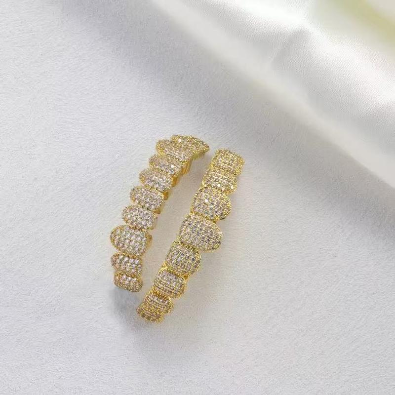 Hip-hop style - teeth with tiny diamonds embedded in the braces. Dental accessories, jewelry in the air, a gift.