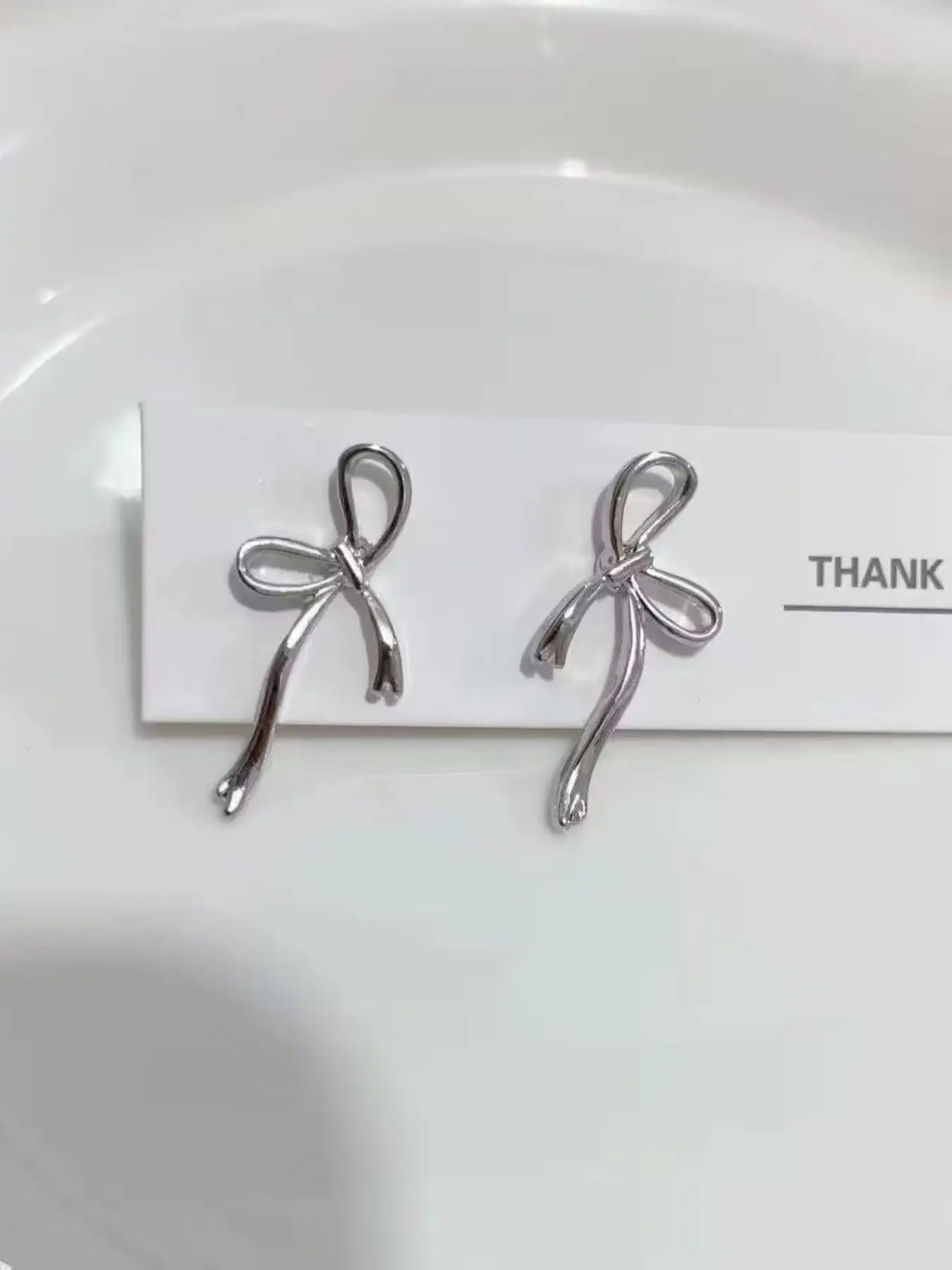 Minimalist Silver Color Bow Stud Earrings for Women, Unique Hollow Design, Elegant All-Season Jewelry, Versatile Commute Ear Accessories