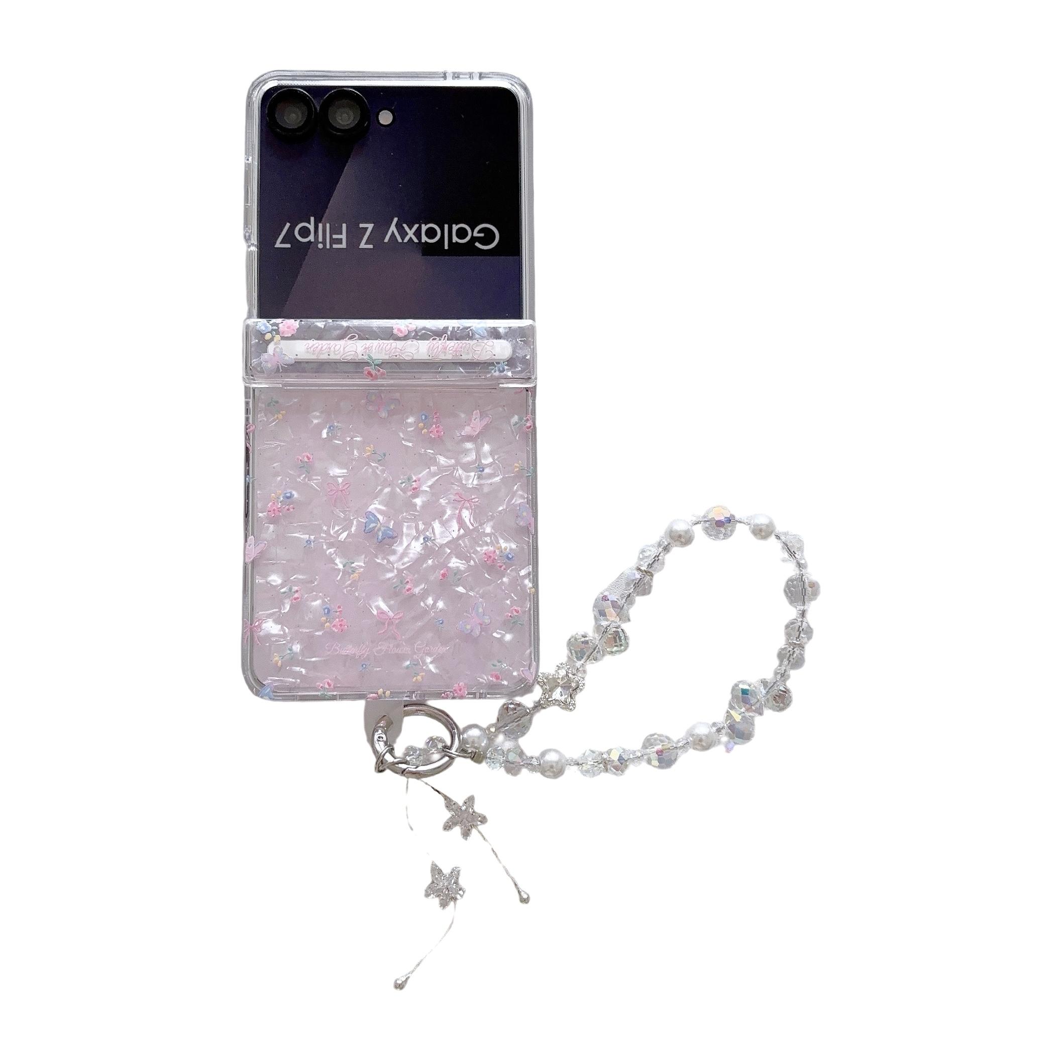 Fresh Floral & Magnetic Snap Shell Pattern Phone Case with optional wrist strap for easy carrying. for Samsung Galaxy Z Flip 5/6/7FE/7. Features a refreshing style, fashionable protection, and unique design perfect for daily use. Protective outer shell.