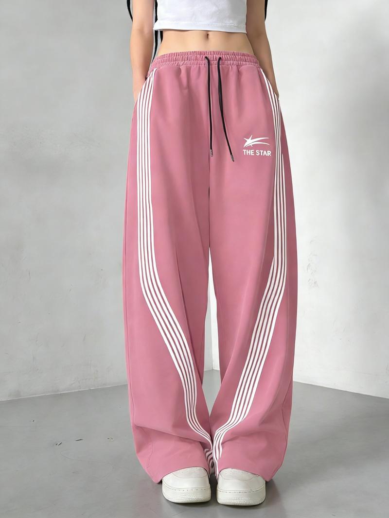 Women's Wide-Leg Track Pants, elastic drawstring waist with contrast side stripes and "THE STAR" logo print, relaxed fit for streetwear, dance and casual daily wear, available in multiple colors