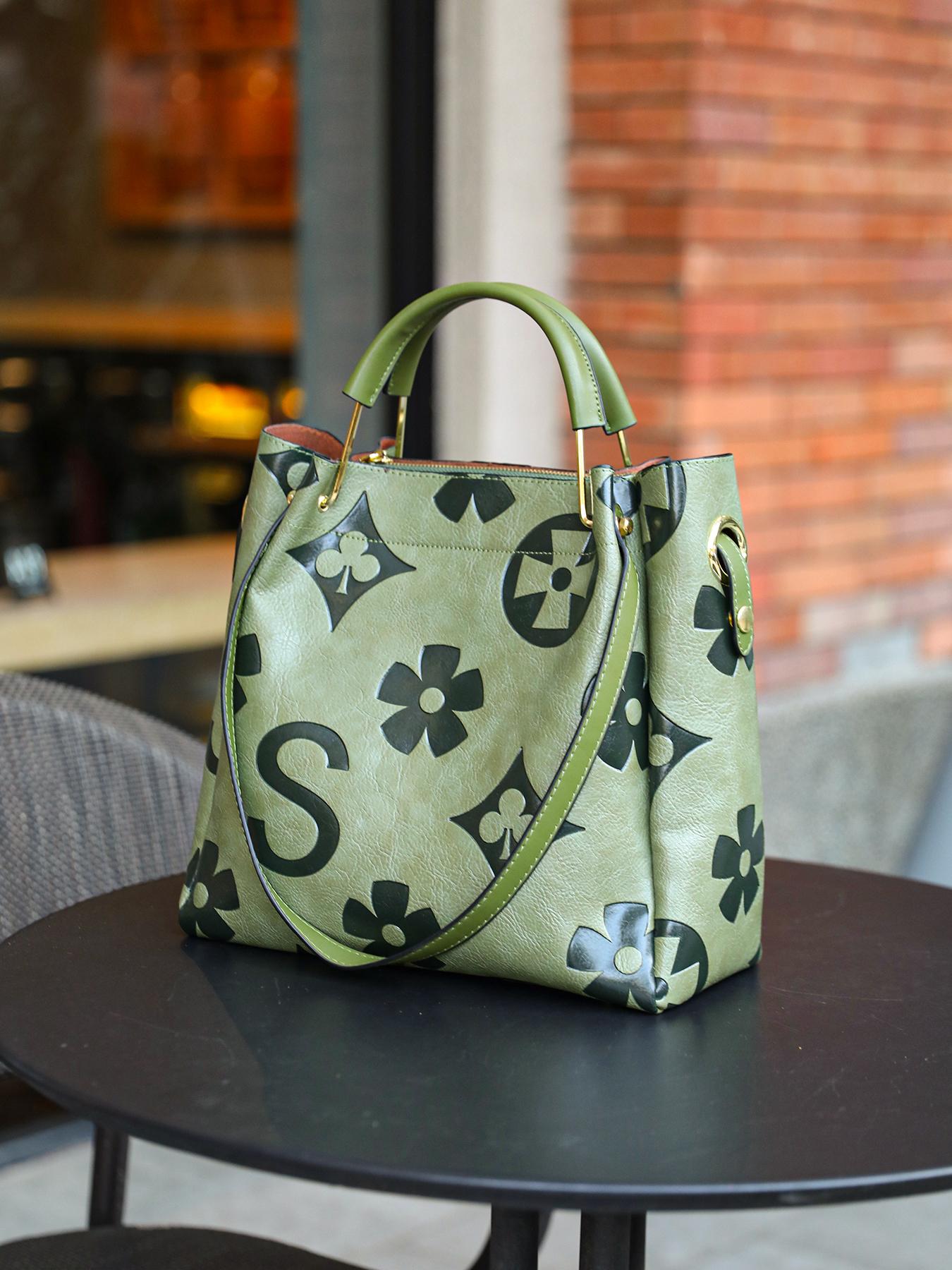 An elegant floral embossed faux leather handbag - suitable for women's use - fade resistant zipper tote bag - equipped with fixed shoulder straps - polyester lining - edge painted - suitable for work and various occasions