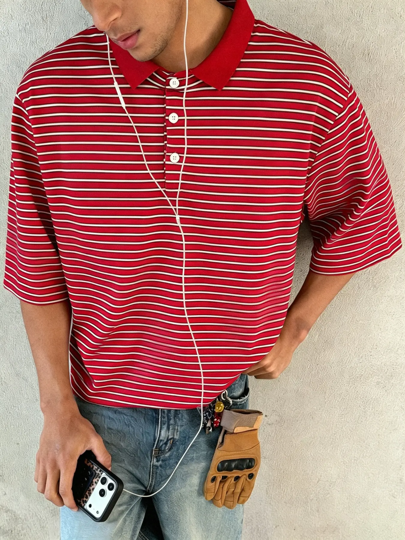 Men's polo shirt featuring a cotton fabric with red and white stripes; designed with a breathable, sweat-absorbent material suitable for summer, a relaxed fit, and a youthful, casual style.
