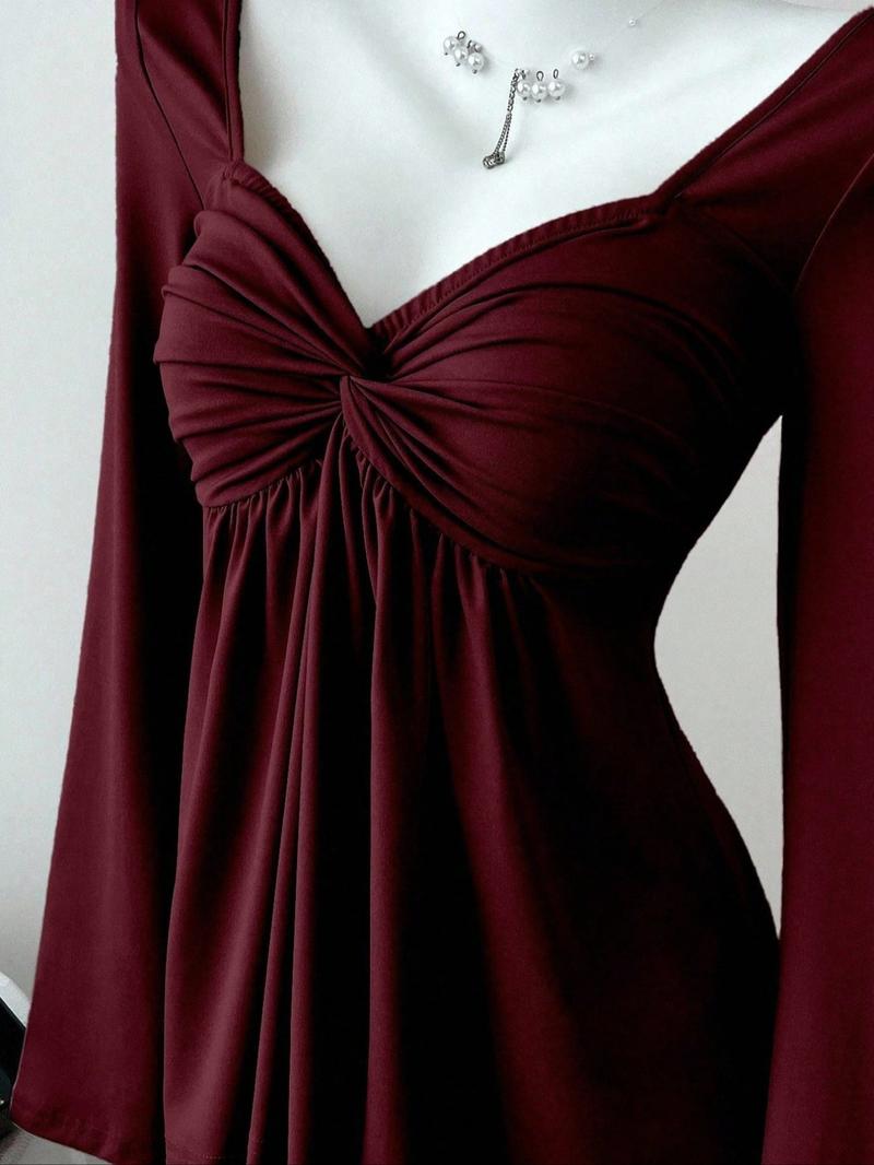 Women's casual V-neck long-sleeved T-shirt with knotted front, a versatile new style, suitable for casual and formal office commuting occasions.