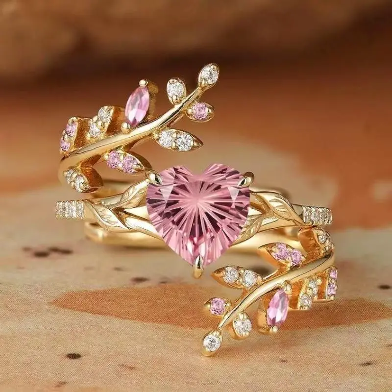 A Stylish Handcrafted Pink Heart-shaped Synthetic Zirconia Engraved Wedding Band Set with Intertwining Branches Design, a Sophisticated Holiday Accessory for Women