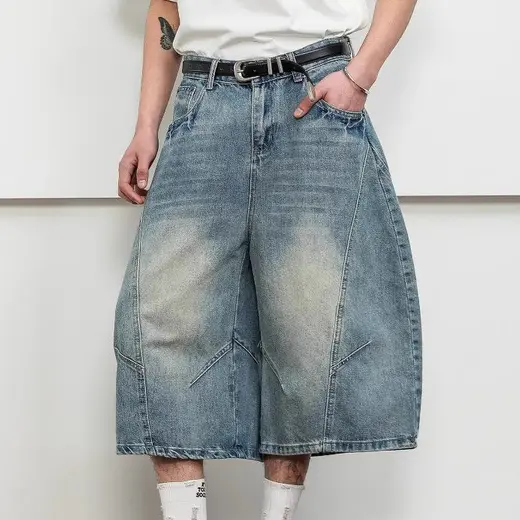 American Retro Washed Deconstructed Curved Hem Denim Cropped Pants For Men, Versatile Street Style Loose Wide-Leg Shorts, Trendy Mid-Length Shorts, Unique Streetwear Cropped Shorts, Wide-Leg Mid-Length Pants