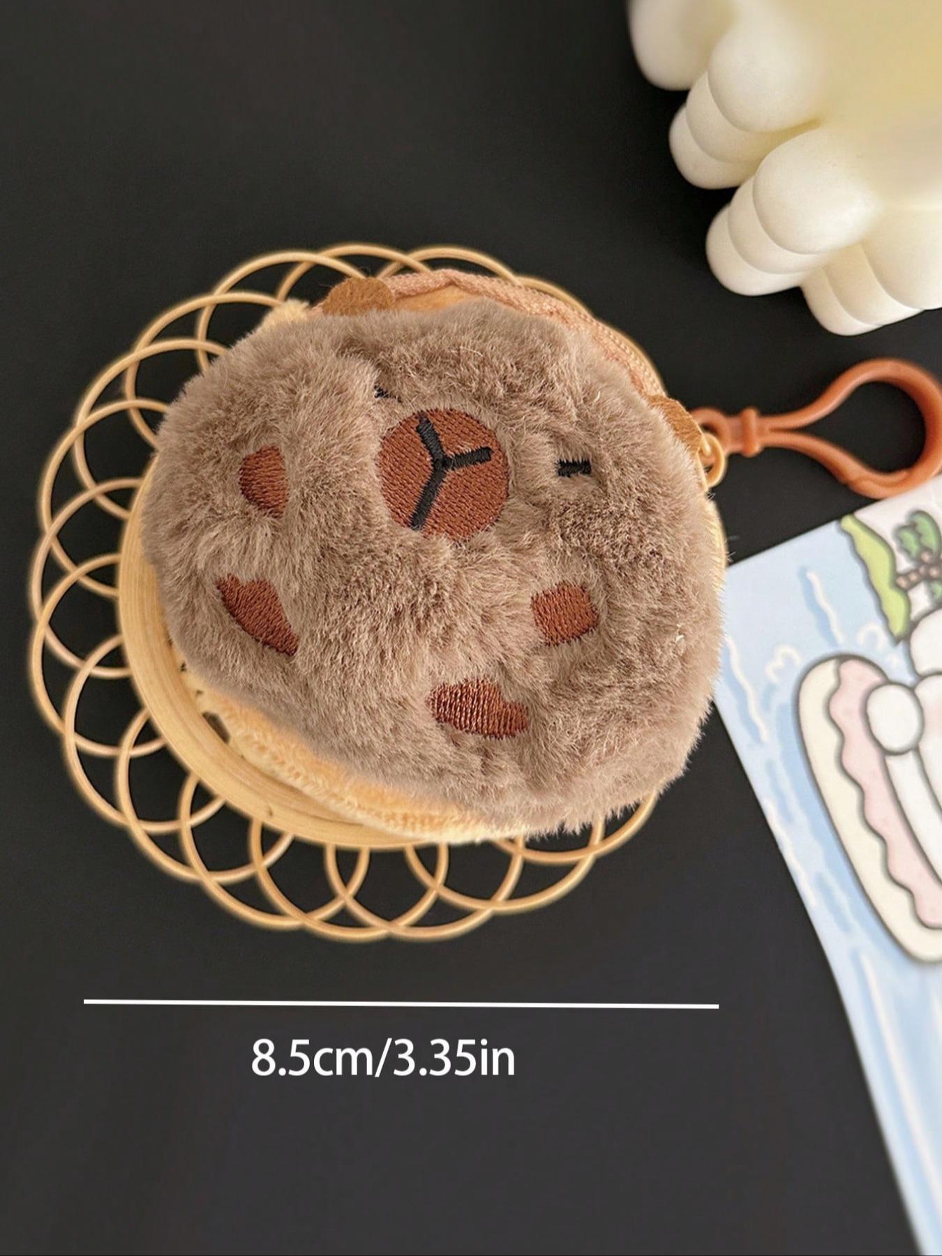 Cute mini plush coin purse, suitable for students, and can also be used as a portable earphone case or a plush backpack accessory. A plush coin purse perfect for storing earphones and lipstick, ideal as a holiday gift or a creative small gift.