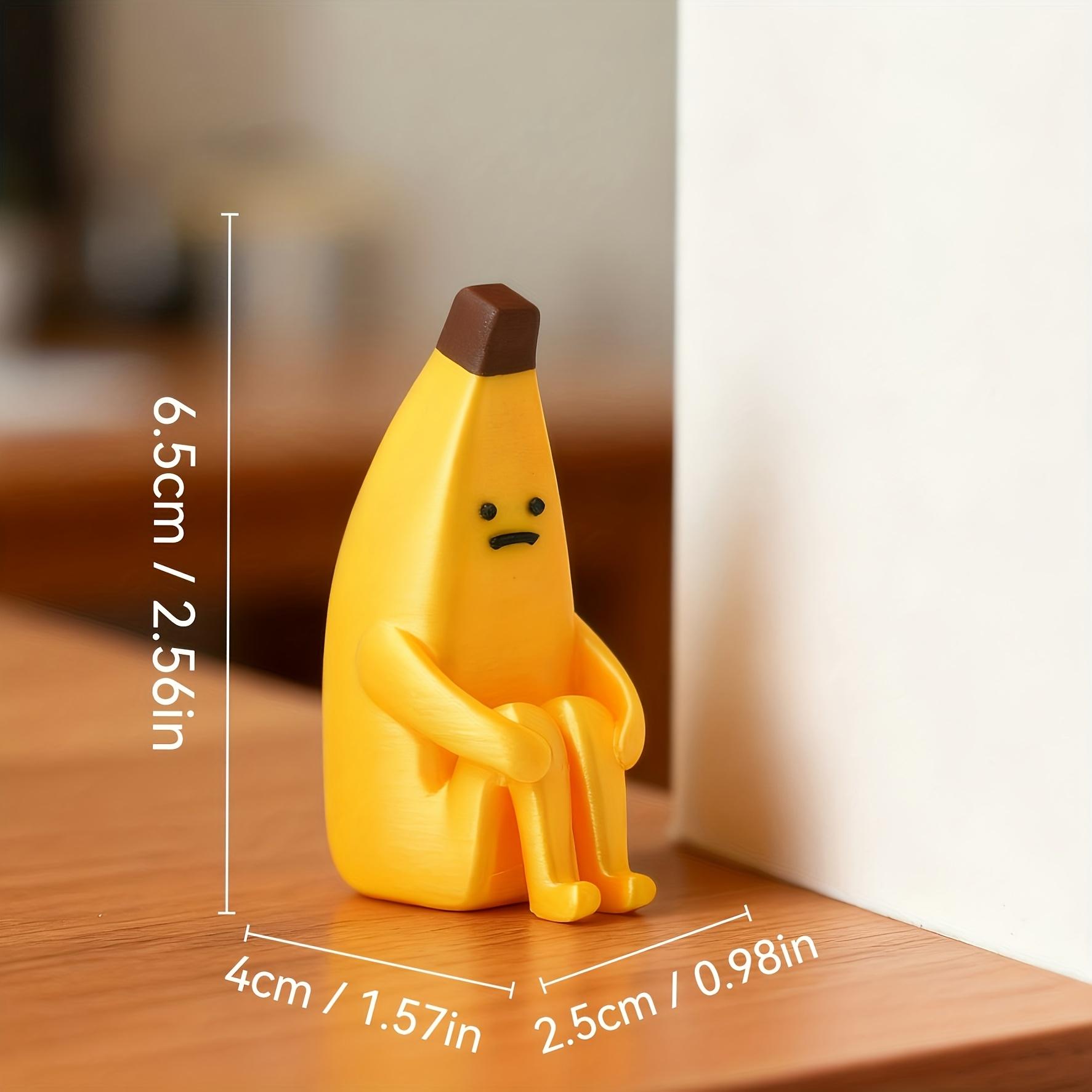 A 3D-printed "Anxious Banana" ornament, crafted from durable plastic—perfect for use as a home tabletop display, office decor, or a unique decorative accent.